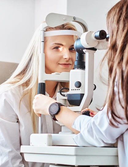 young woman during eye exam and vision test