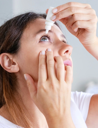 patient using dry eye drops