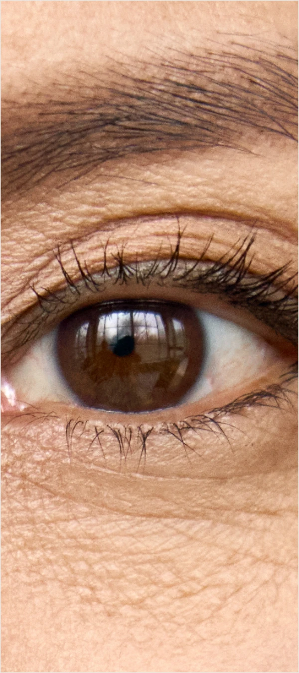 close up of brown eye of mature woman