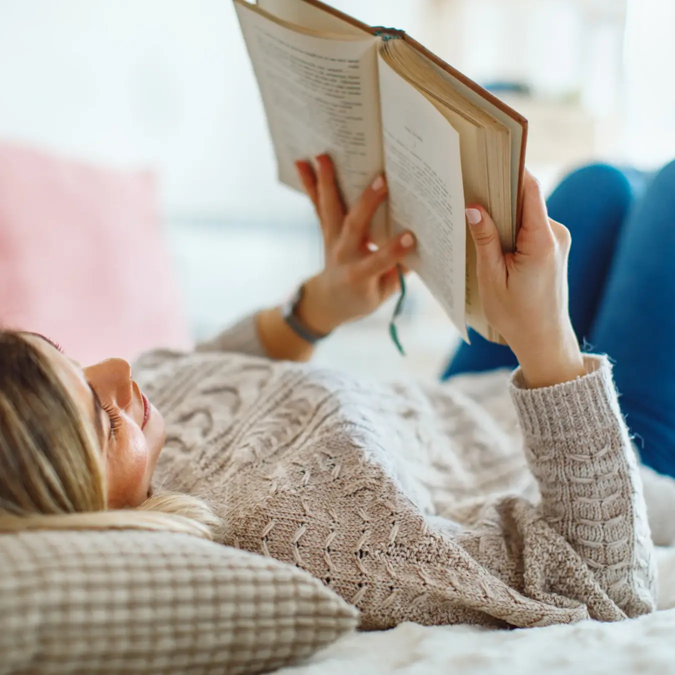 senior woman reading a book