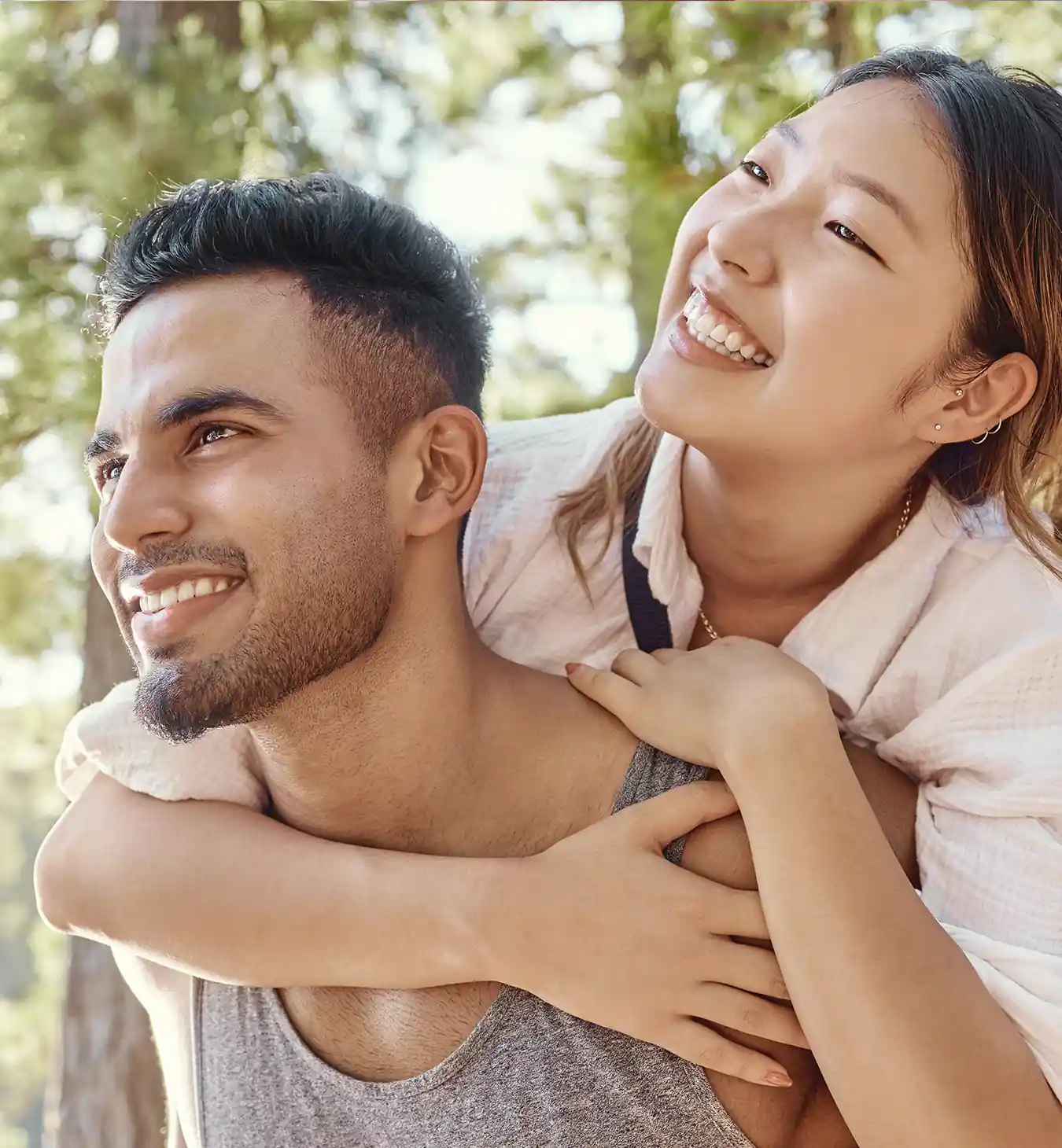young happy couple enjoying the outdoors