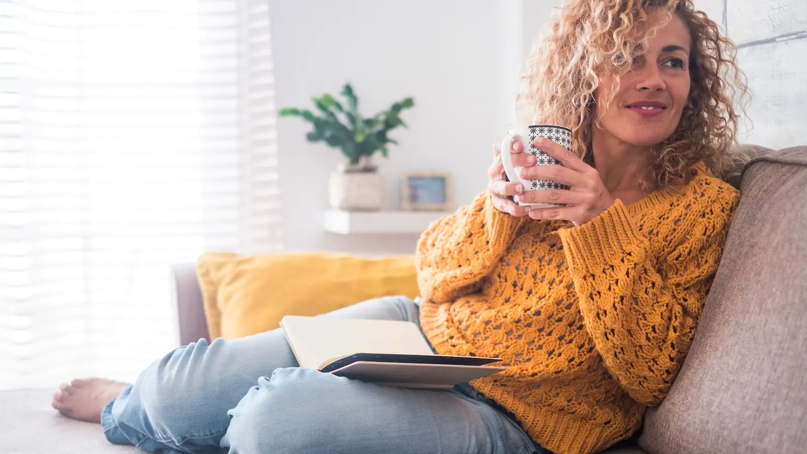 woman reading a book with no glasses