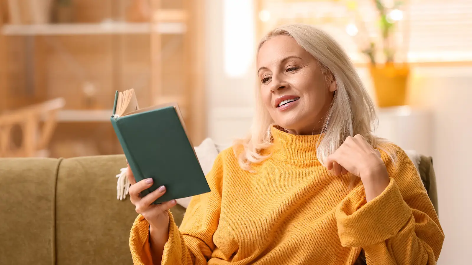 woman reading a book with no glasses