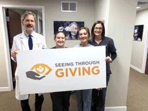 seeing through giving group photo