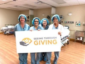 seeing through giving group photo