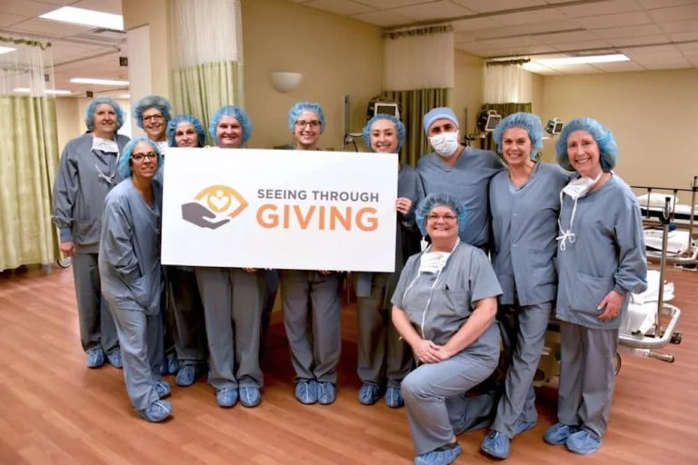 seeing through giving group photo