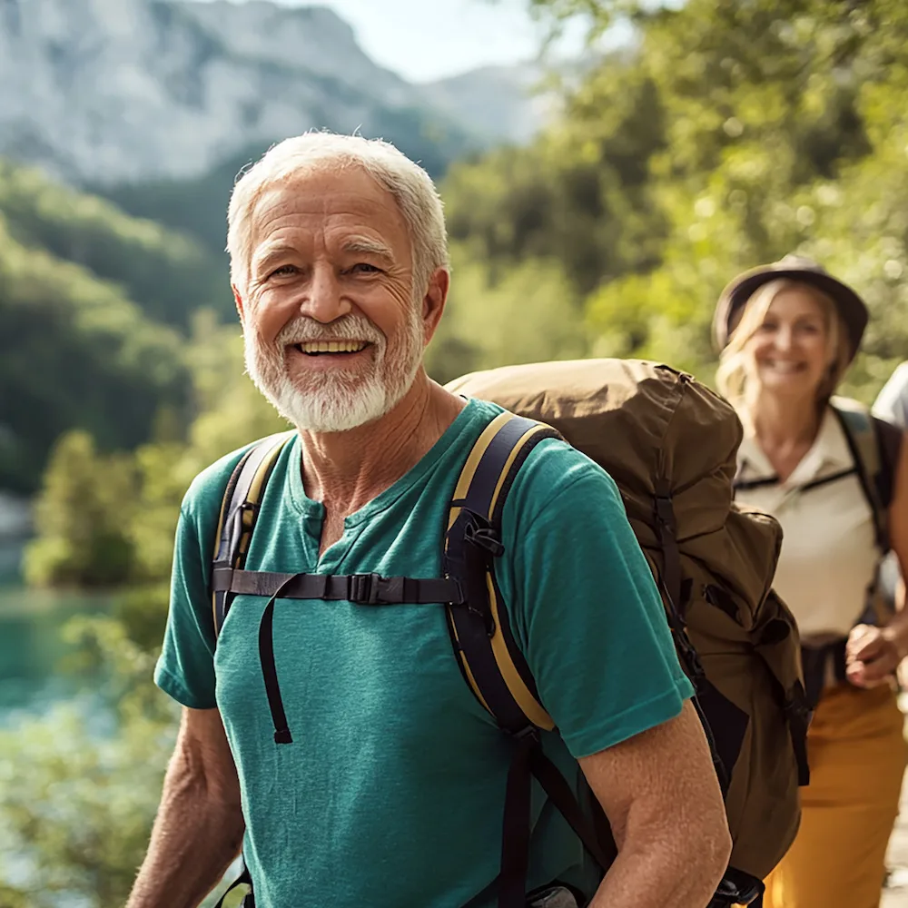 senior man hiking on a trail