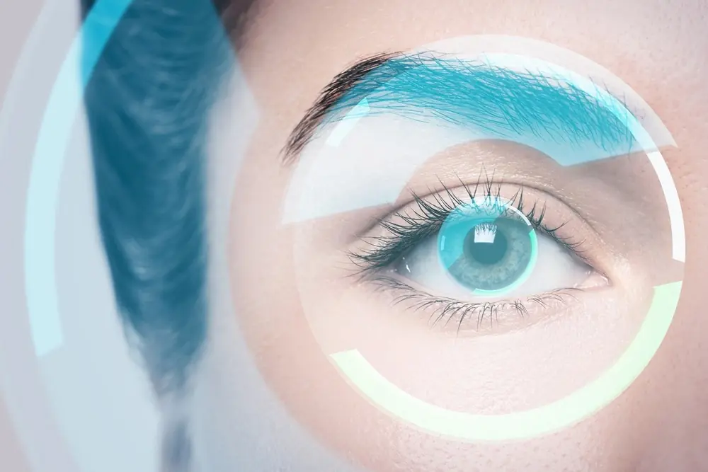 close up of eye and laser